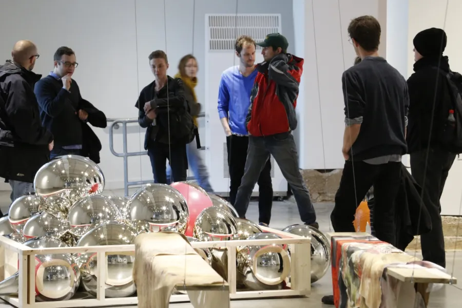 Visitors at the MFA Exhibition at the Urban Arts Space