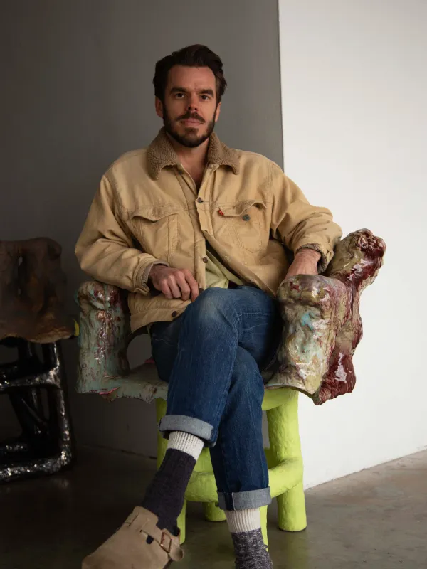 a person sitting in a chair 